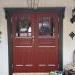 Double wooden doors in red color